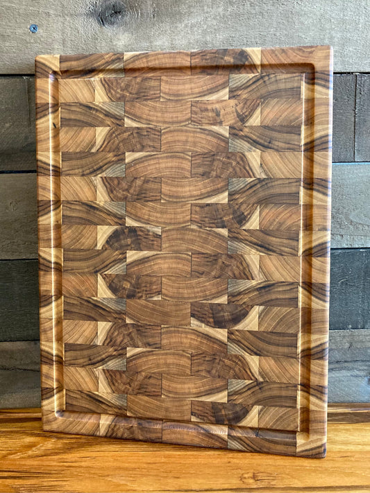 Teak cutting board with juice groove